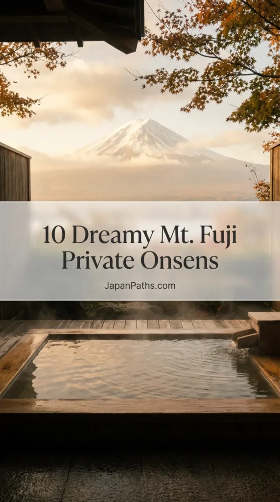 A serene view of Mount Fuji framed by the window of a traditional wooden bathhouse, showcasing one of the 10 Dreamy Mt. Fuji Private Onsens. Ideally suited for Japan Travel planning, this image depicts a luxury ryokan experience with steam rising from the hot spring water, embodying the relaxation of Japanese Culture.