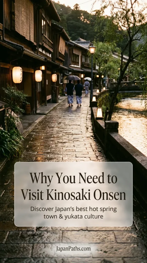 A scenic view of people wearing yukata robes walking along a stone canal lined with willow trees and lanterns at dusk. The image captures the traditional atmosphere and explains Why You Need to Visit Kinosaki Onsen for a unique Japan Travel experience, focusing on Japanese Culture and relaxation in a historic hot spring town.